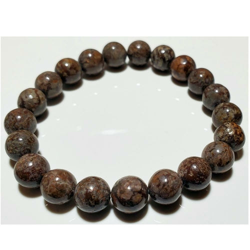 8mm petrified wood beaded elastic stretch bracelet by Silver Hestia, featuring natural wood beads for a stylish jewelry accessory.