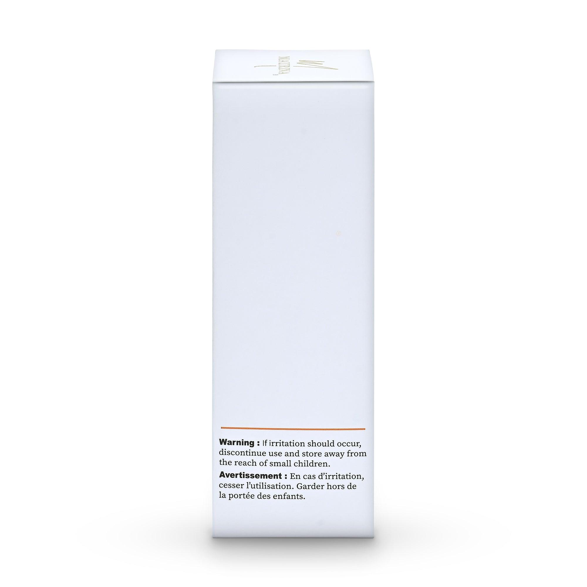 Orchid Zeus Vitamin C face serum with hyaluronic acid and retinol, featuring a sleek glass bottle and dropper applicator.