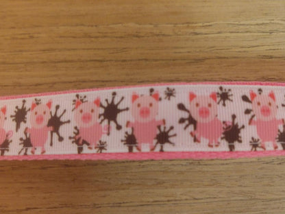 Green Thalassa small pig collar featuring a playful pigs in the mud design, ideal for pet wear and leash accessories.