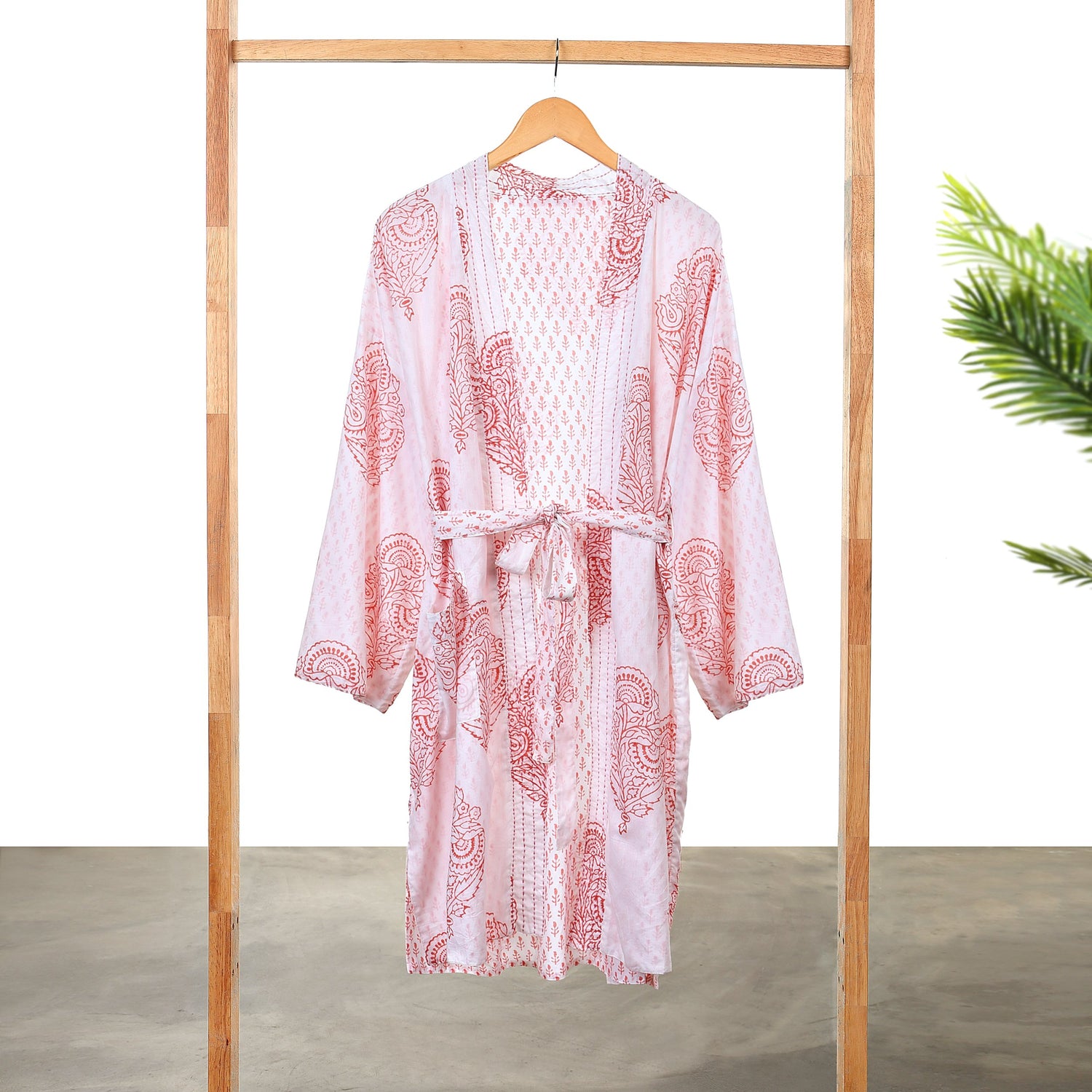 Pink block-printed robe from Pink City by Ivory Meleager, featuring vibrant traditional patterns for gifts or casual wear.