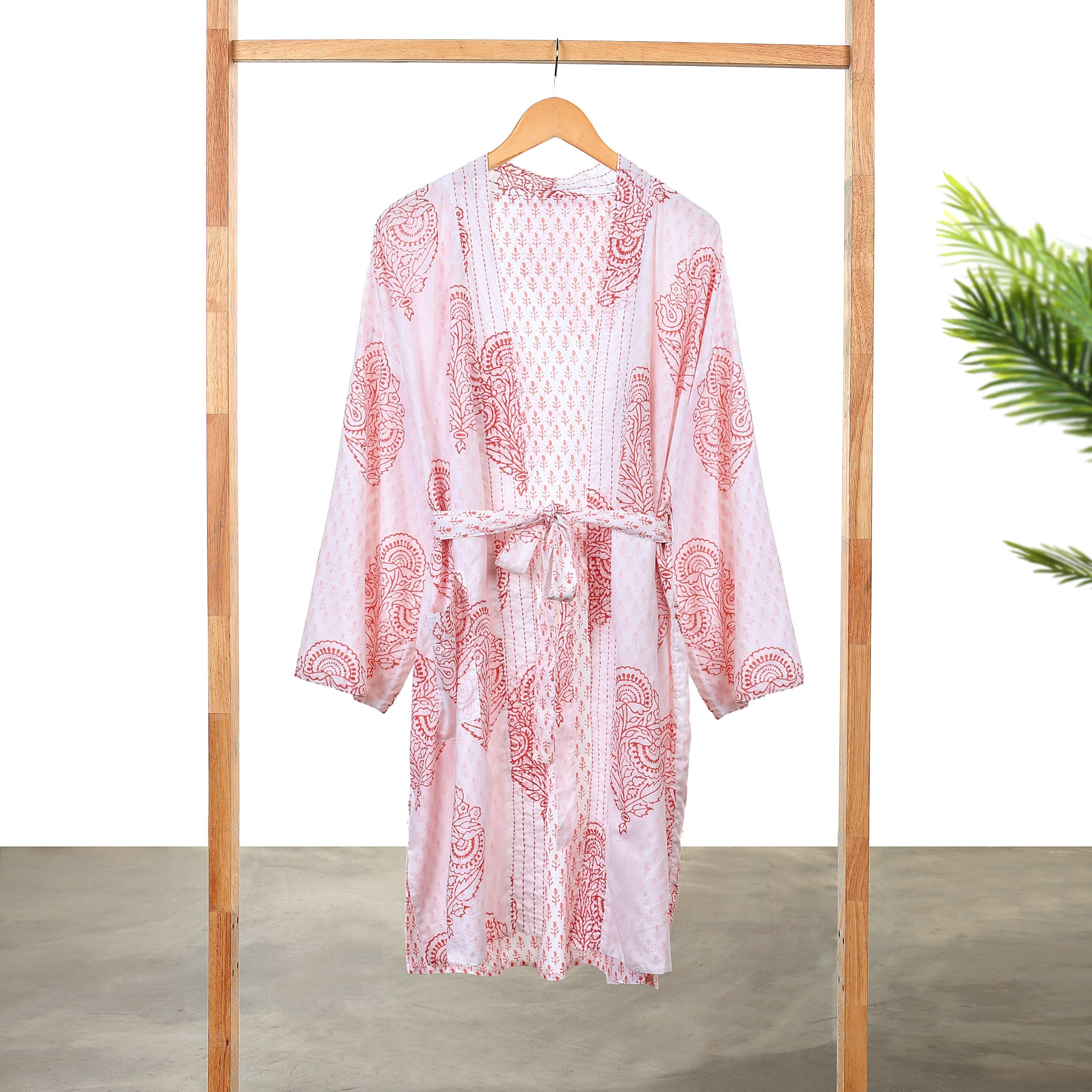Pink block-printed robe from Pink City by Ivory Meleager, featuring vibrant traditional patterns for gifts or casual wear.