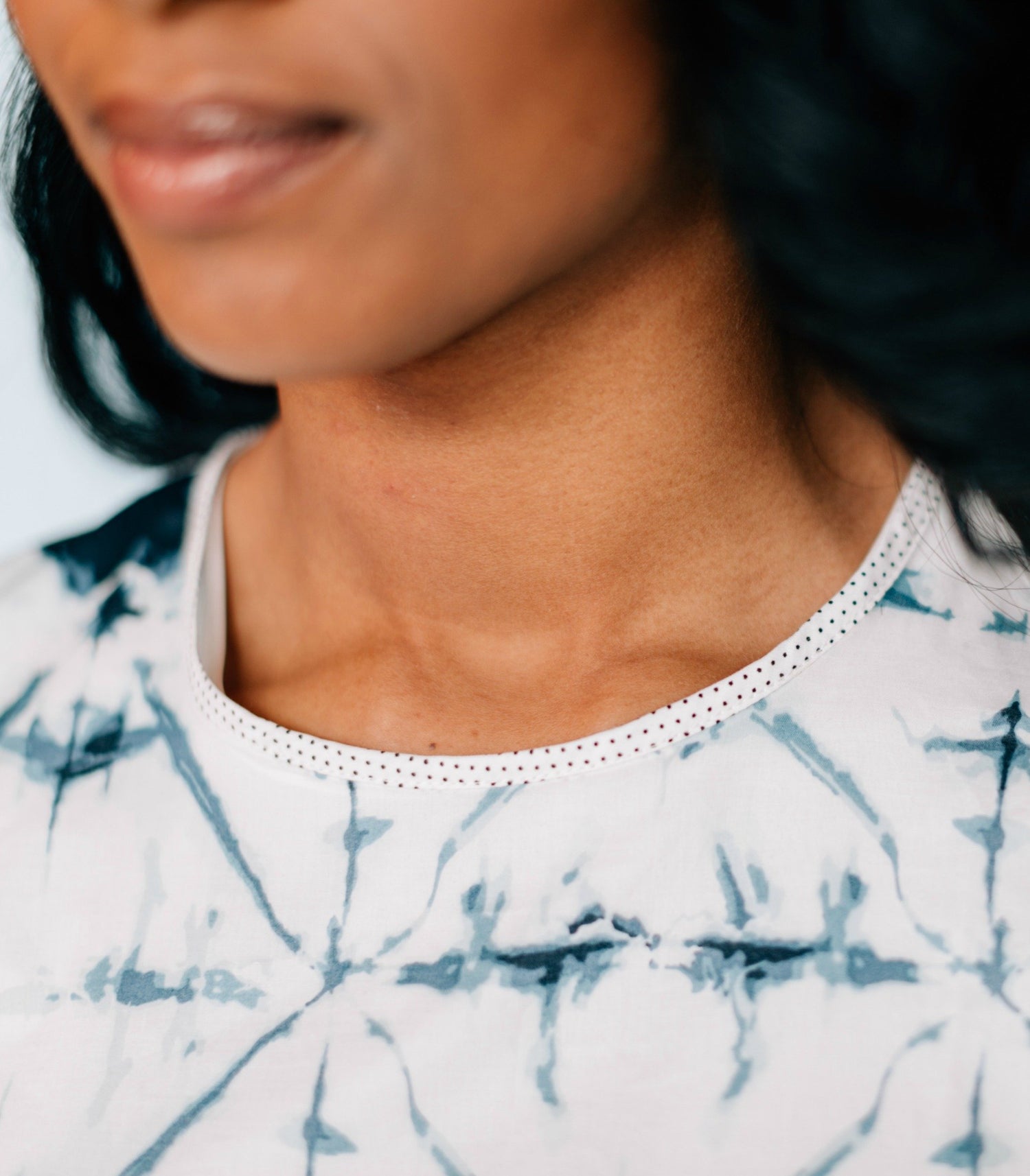Portrait of a Salmon Bella Inkwell Dress, showcasing its elegant design and flowing fabric perfect for formal occasions.