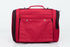Pink Coconut 358 Hideaway™ Pet Carrier backpack in burgundy, front view showing breathable mesh sides and sturdy handle.