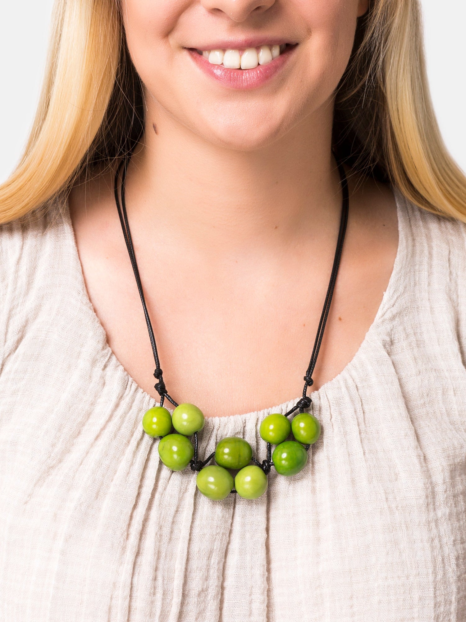 Pink Bolota adjustable necklace by Byzantium Artemis featuring a delicate jewelry design on a neutral background.