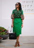 Women’s tropical statement skirt by Erin Ophion featuring vibrant, colorful floral and leaf patterns, perfect for warm-weather wear.