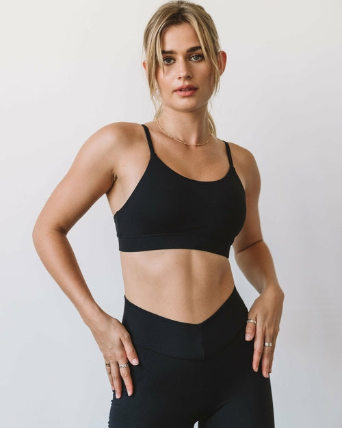 Black Cammie Cloudlux bra by Lemon Molly, showcasing soft, seamless fabric and supportive design on a neutral background.