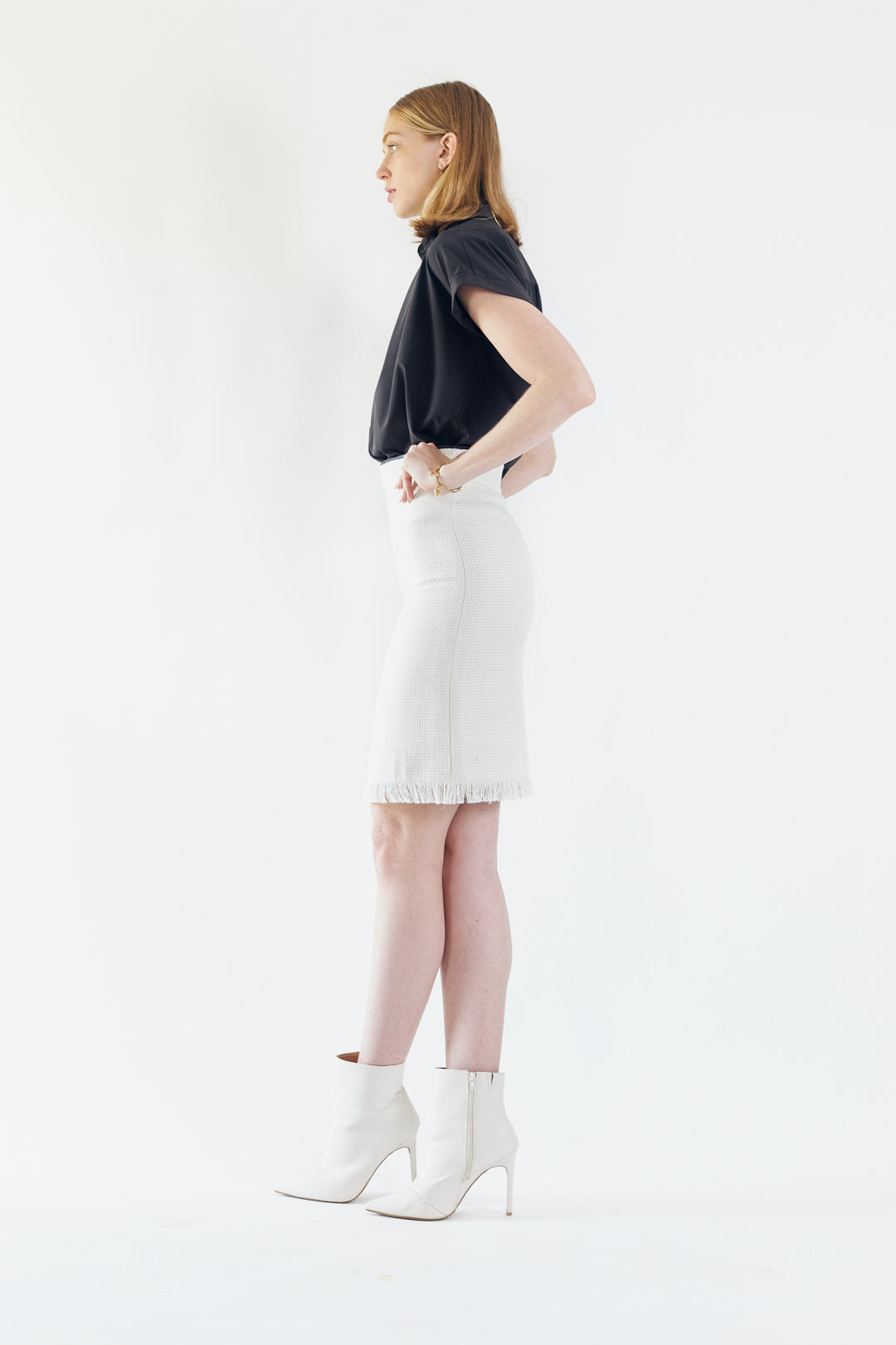 Luxe white mini tweed skirt for women by Mauve Daisy, featuring a chic, stylish design perfect for fashionable outfits.