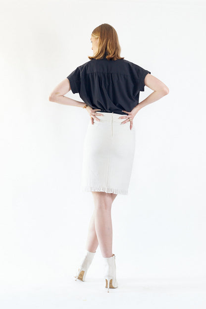 Luxe white mini tweed skirt for women by Mauve Daisy, stylish chic mini skirt with textured fabric and tailored fit.