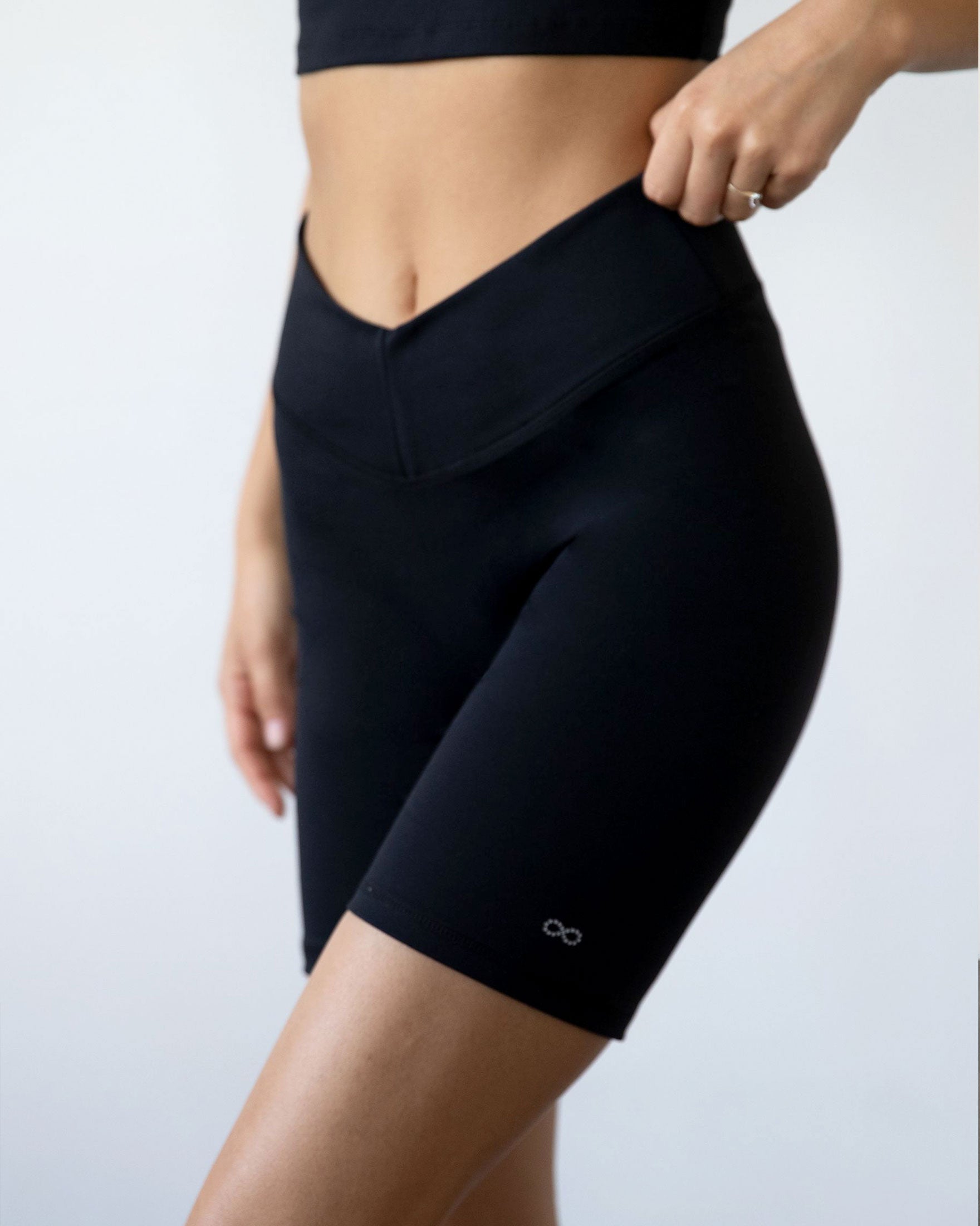 Black Lemon Molly Vendetta Biker Shorts 7-inch length, close-up side view of women&
