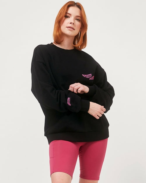 Black elegant blouse by Start2Finish, front view showing stylish collar and smooth fabric, with additional clothing accessories.