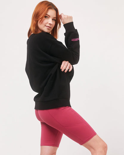 Black elegant blouse from Start2Finish with side view, showcasing stylish design and fabric details.