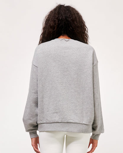 Gray elegant blouse from Start2Finish with matching accessories, shown on a hanger against a plain background.