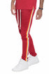Bright rainbow track pants by Lime Milo featuring bold colorful stripes, full-length athletic pants for active wear.
