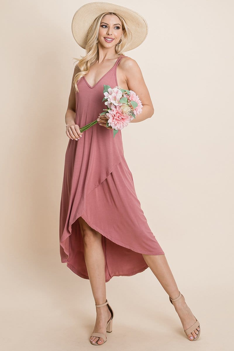 Dusty pink deep V cami casual dress by Aquamarine Gaia featuring high-low hem and crisscrossing strap design for women.