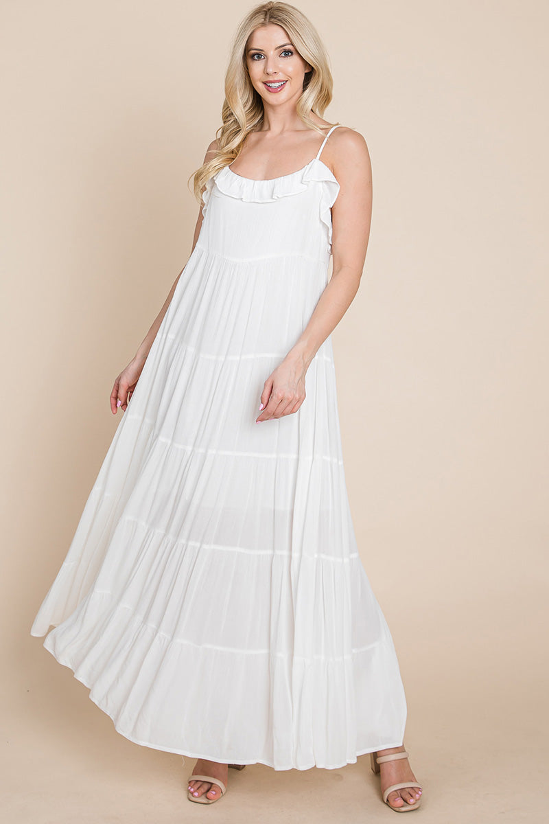 Cream tiered tie strap cami maxi dress for women from Aquamarine Gaia, featuring a flowy silhouette and adjustable straps.