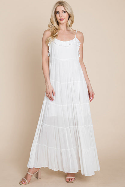 Cream tiered tie strap cami maxi dress for women by Aquamarine Gaia, featuring layered fabric and adjustable straps.