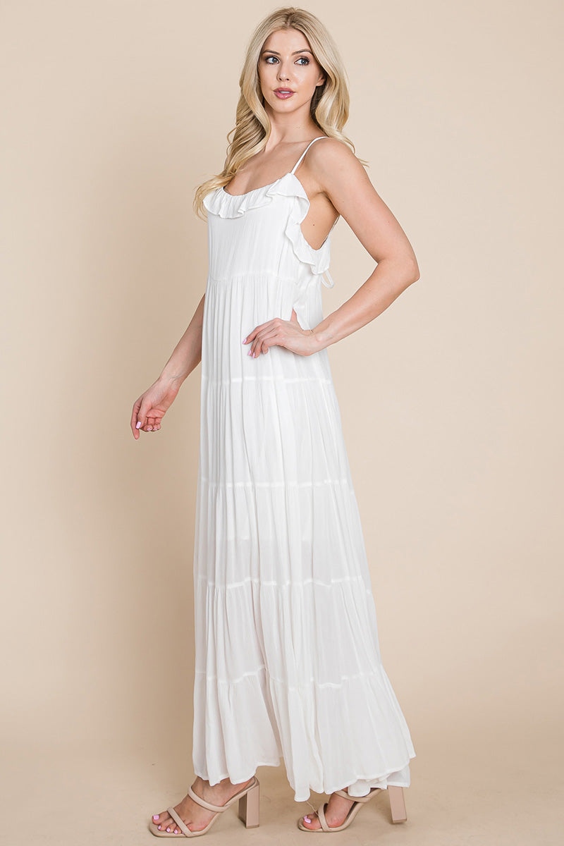 Cream tiered tie strap cami maxi dress for women by Aquamarine Gaia, featuring a flowing silhouette and adjustable straps.