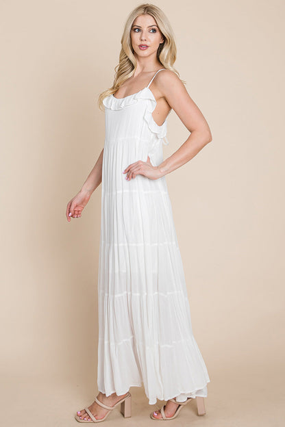 Cream tiered tie strap cami maxi dress for women by Aquamarine Gaia, featuring a flowing silhouette and adjustable straps.