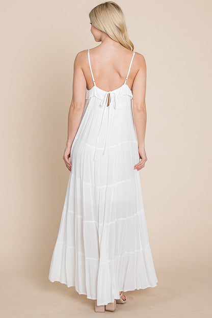 Cream tiered tie strap cami maxi dress for women by Aquamarine Gaia, featuring a flowing silhouette and adjustable straps.
