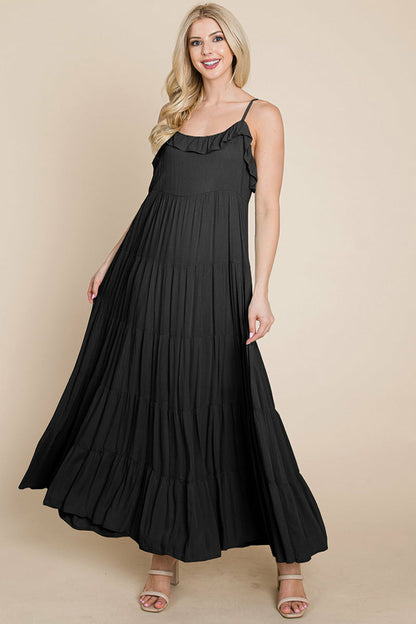 Black tiered tie strap cami maxi dress for women by Aquamarine Gaia, featuring layered fabric and adjustable straps.