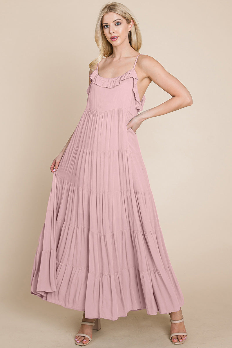 Pink tiered tie strap cami maxi dress for women by Aquamarine Gaia, featuring layered fabric and adjustable shoulder straps.