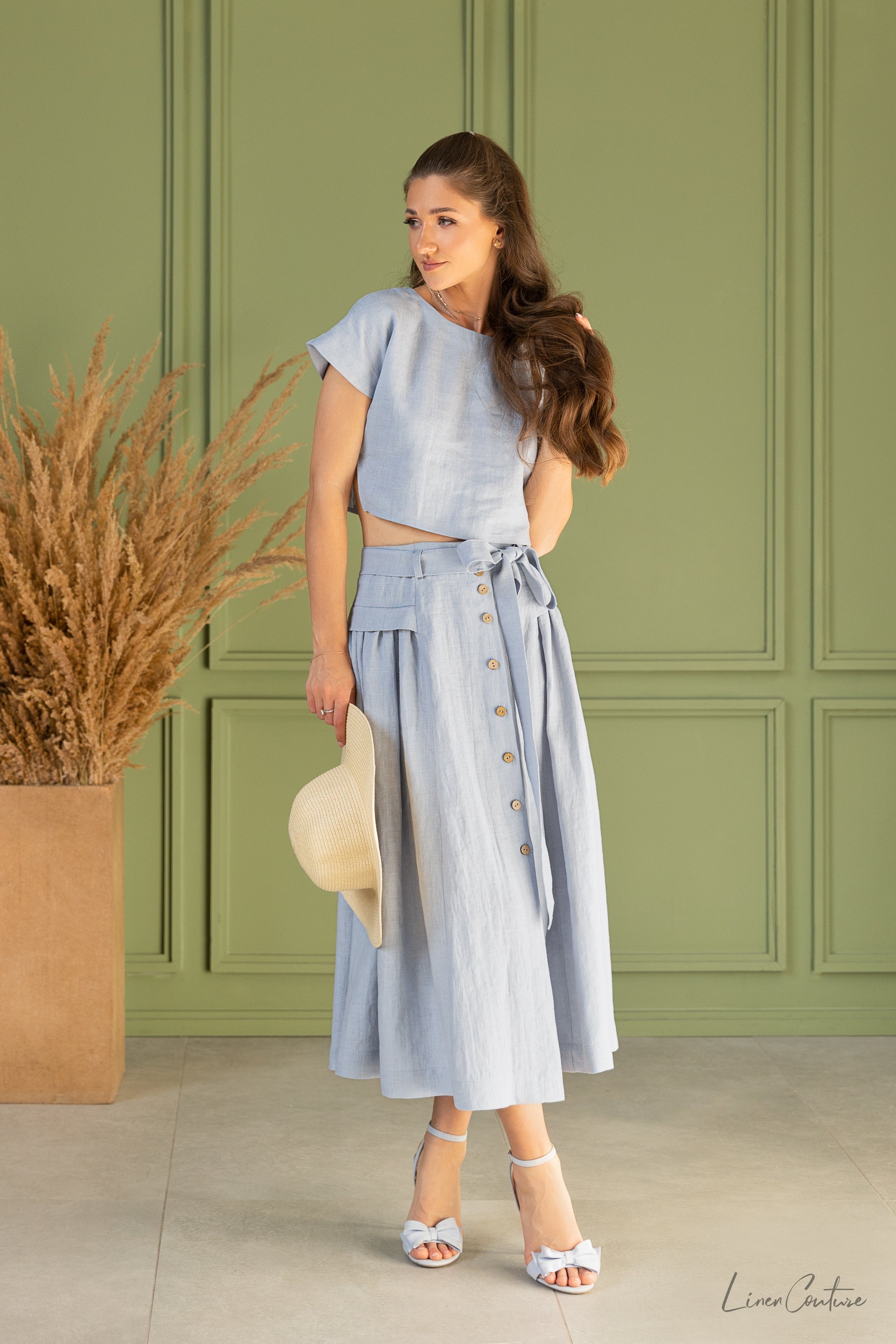 Magenta Sugarplum Taormina linen crop top and flared midi skirt matching set, stylish and lightweight for summer wear.