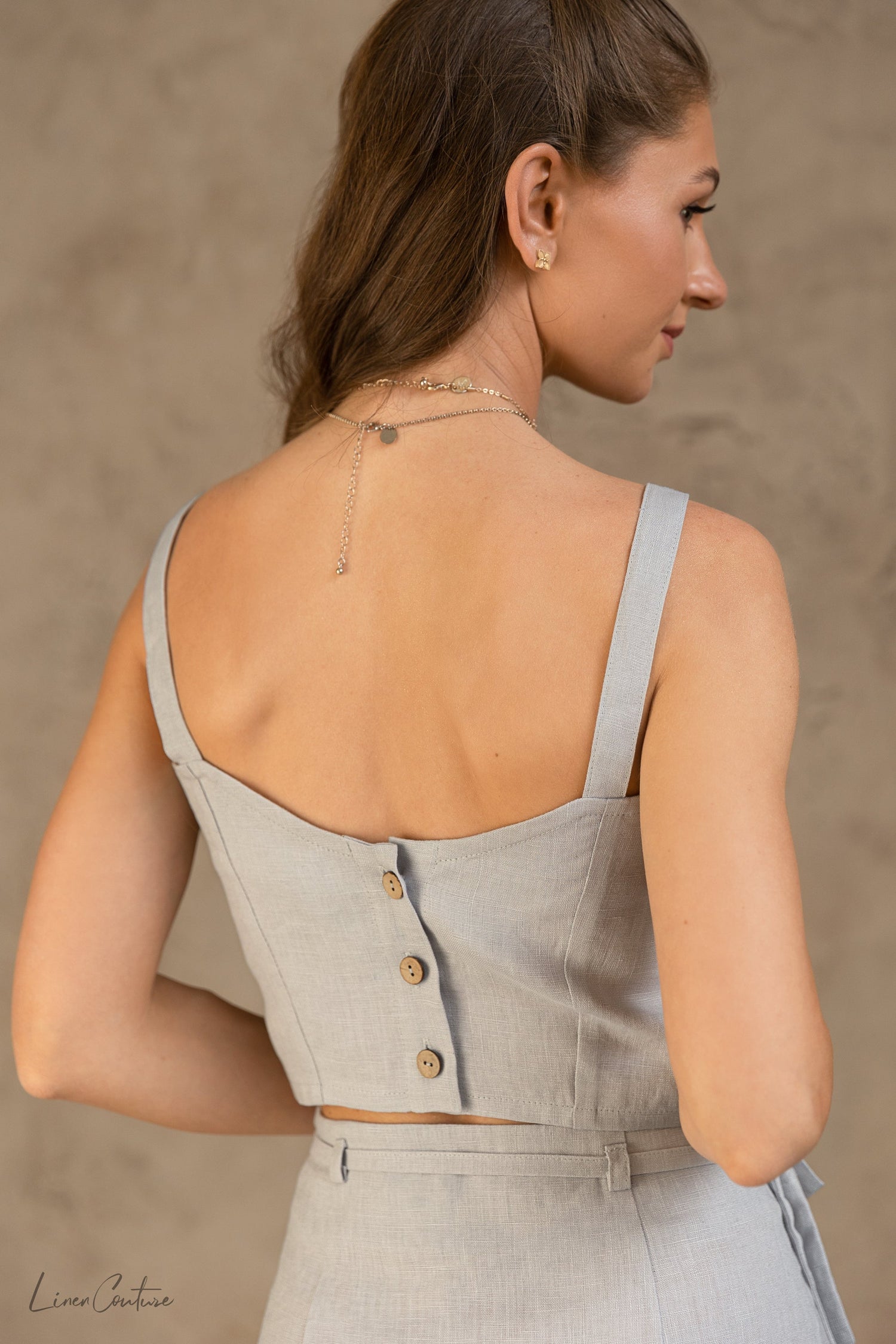 Light grey linen crop top and midi skirt set by Magenta Sugarplum, stylish Bella Vita matching set for casual and chic looks.