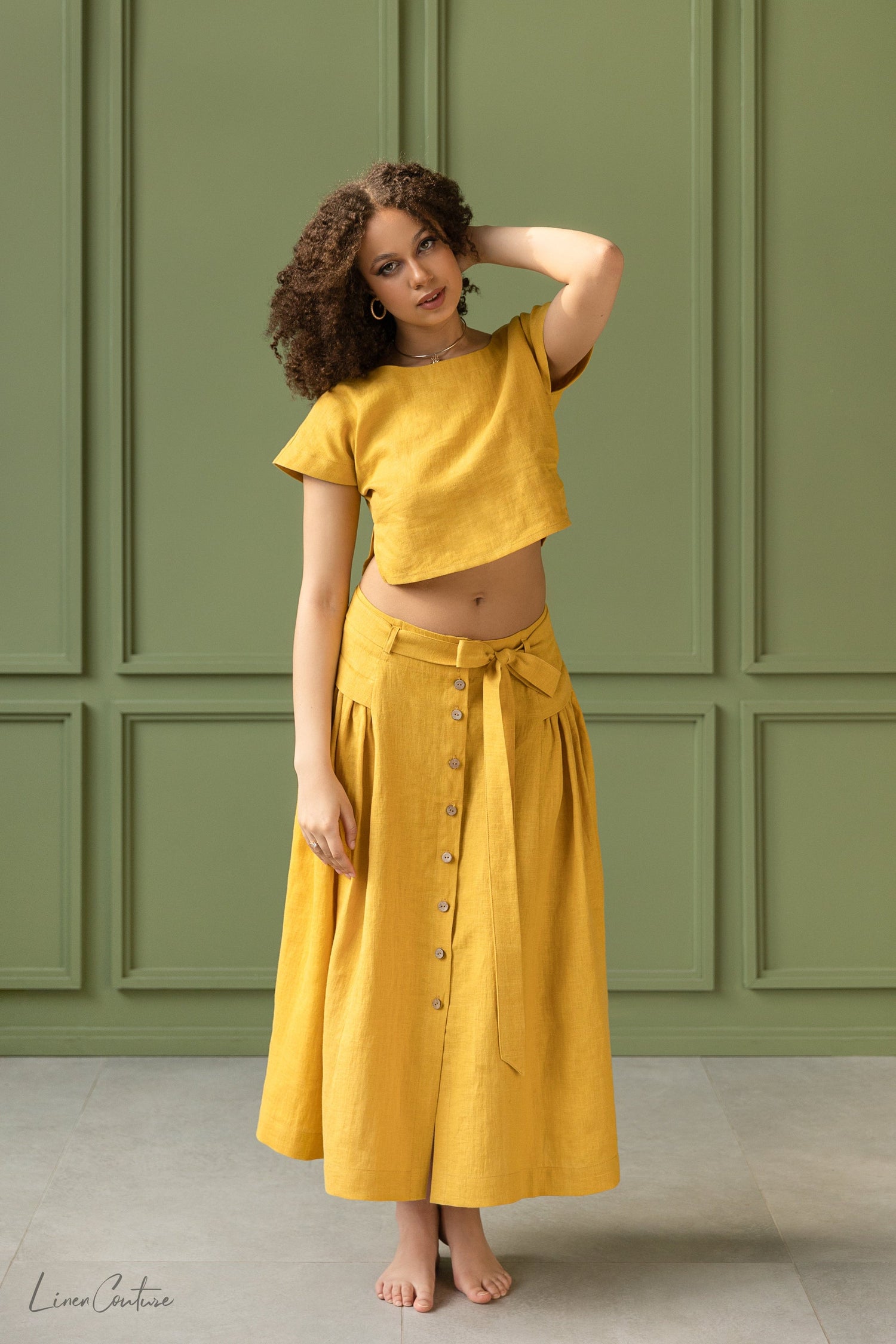 Magenta Sugarplum Taormina linen crop top and flared midi skirt matching set displayed on a model