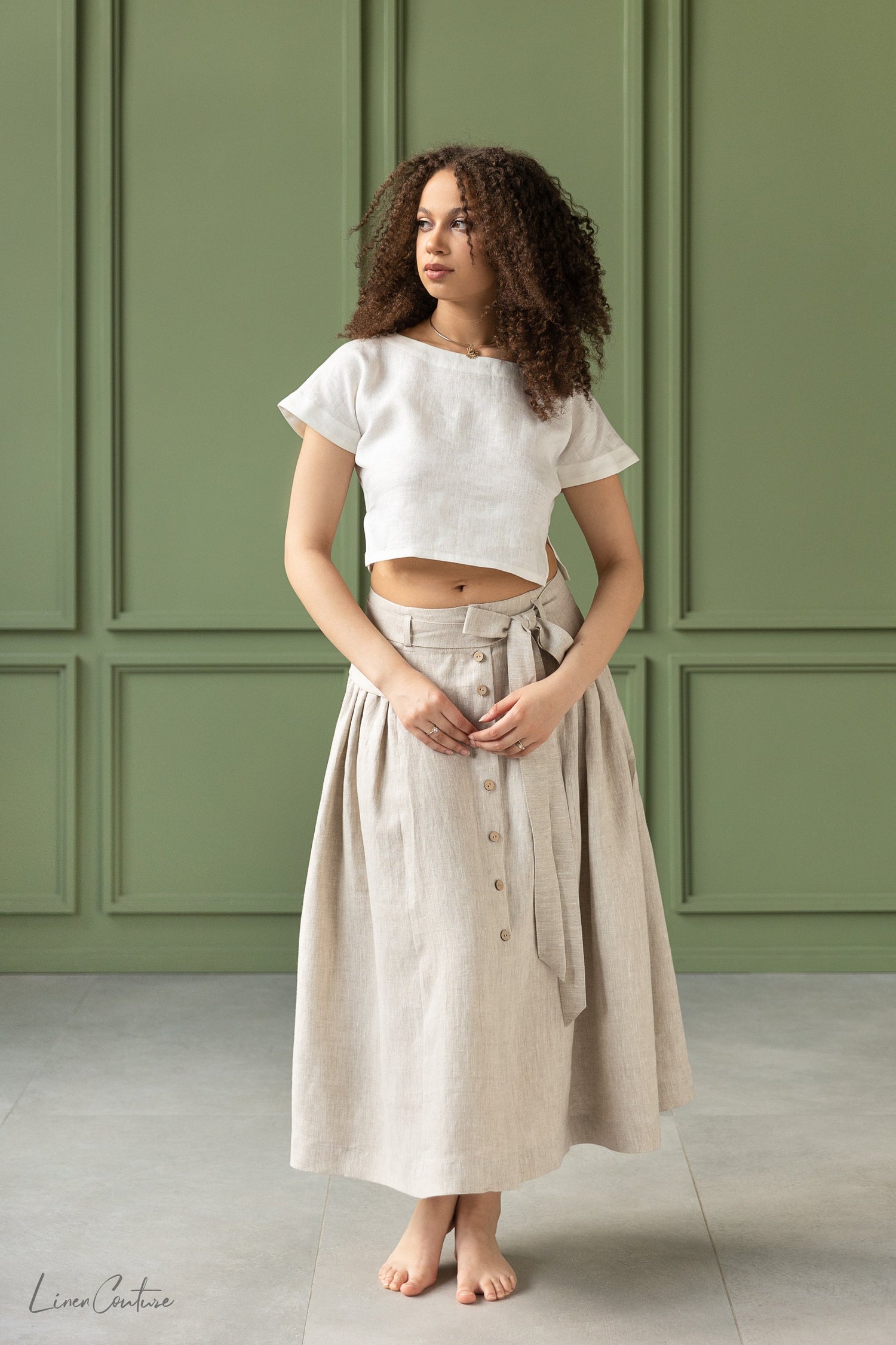 Magenta Sugarplum Taormina linen crop top and flared midi skirt matching set, shown in a coordinated fabric and style.