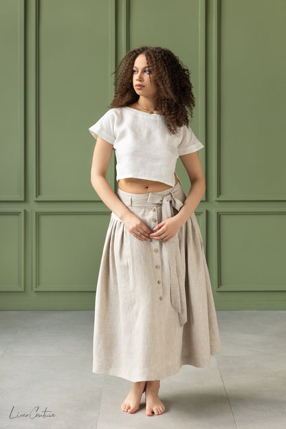 Magenta Sugarplum Taormina linen crop top and flared midi skirt matching set, shown in a coordinated fabric and style.