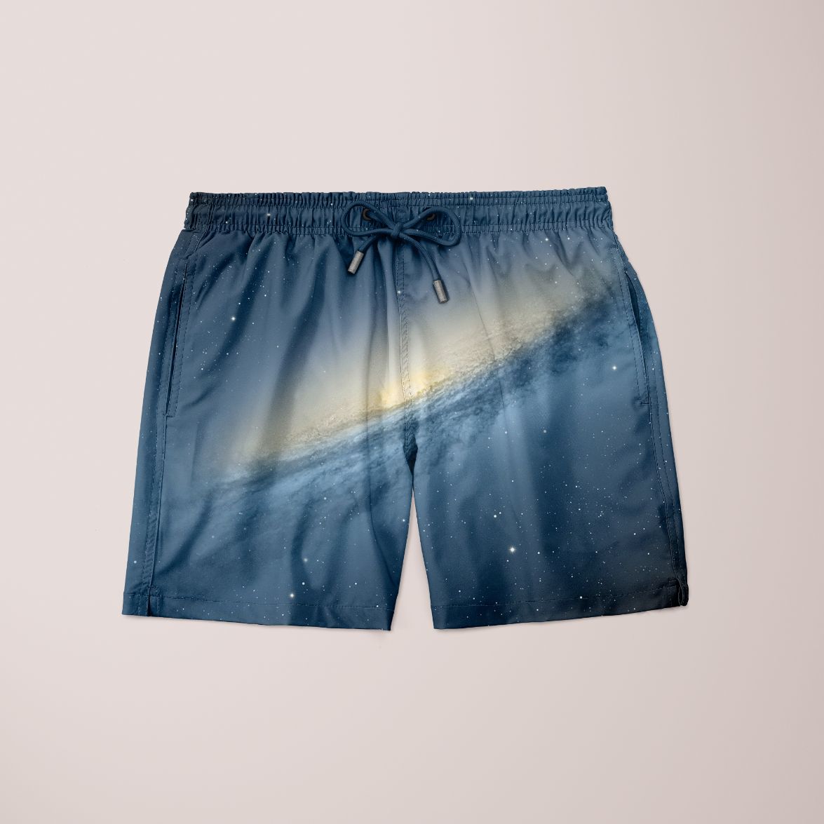 Scorpius Awe Galaxy Shorts, stylish clothing with galaxy-inspired pattern, displayed on a hanger against a plain background.