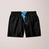 Scorpius Cave Shorts made of lightweight fabric, displayed on a hanger, featuring a casual fit and neutral color for relaxed summer wear.