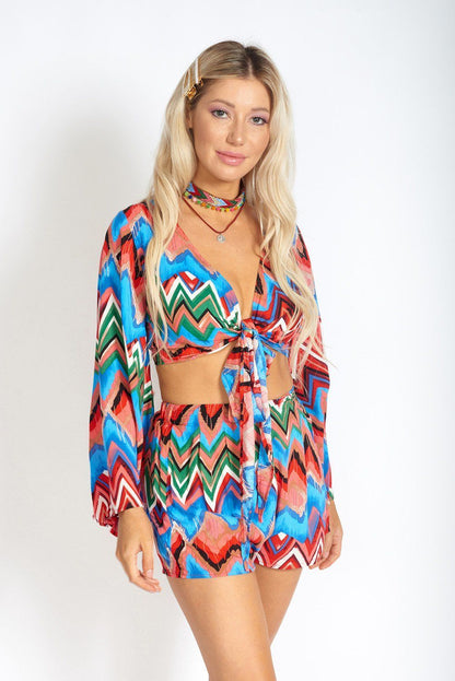 Rainbow Waves Bohemian front tying crop top for women, featuring vibrant rainbow waves and relaxed bohemian style.