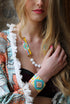 Colorful rainbow bracelet set by Yellow Athena, featuring vibrant, woven bracelets with bright rainbow patterns and adjustable clasps.