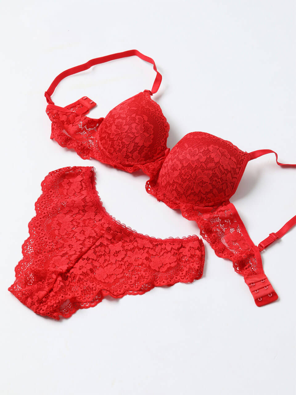 Red lace half cup bra set for women featuring intricate lace details and supportive design by Harlequin Icarus.
