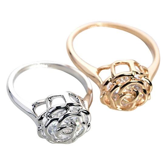 Salmon Lucky Rose Is A Rose rings with 18kt rose crystals in white, yellow, and rose gold, showcasing elegant jewelry design.