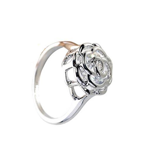 Salmon Lucky Rose Is A Rose ring with 18kt rose crystals in white, yellow, and rose gold, featuring intricate jewelry design.