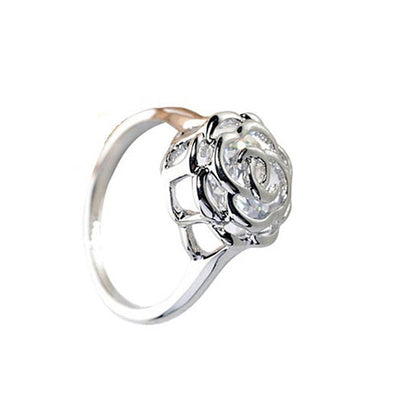 Salmon Lucky Rose Is A Rose ring with 18kt rose gold and white, yellow, and rose crystal accents, elegant jewelry accessory.