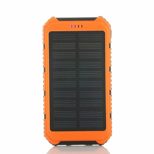Salmon Lucky roaming solar power bank charging a smartphone outdoors, portable solar-powered tech accessory for phones and tablets.