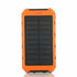 Salmon Lucky roaming solar power bank charging a smartphone outdoors, portable solar-powered tech accessory for phones and tablets.