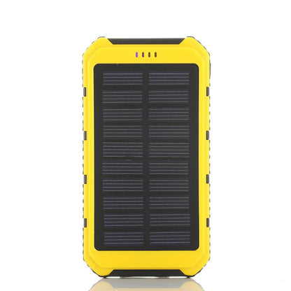 Salmon Lucky roaming solar power bank charging a phone outdoors, portable eco-friendly tech accessory for phones and tablets.
