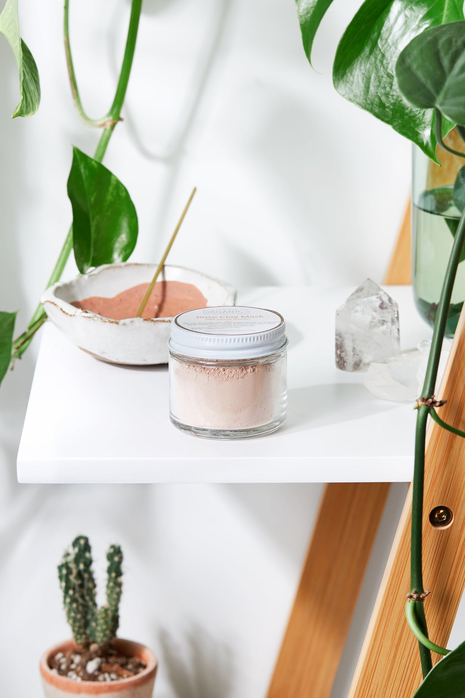 White Smokey Rose Clay Face Mask in a jar, showcasing the pink clay texture and natural ingredients for skincare.