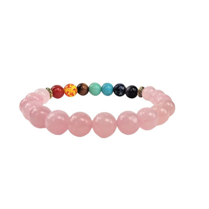 Rose quartz chakra healing bracelet featuring smooth pink stones, designed for self-love and energy balancing.