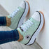 Silver Juneberry flat lace-up sneakers with patterned canvas for women, casual sport shoes with a stylish, comfortable design.