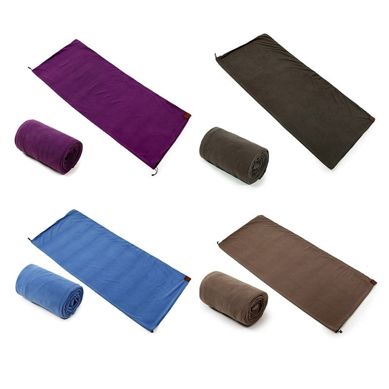 Yellow Pandora lightweight polar fleece camping sleeping bag spread open, showing its soft, insulated interior for outdoor sleeping comfort.
