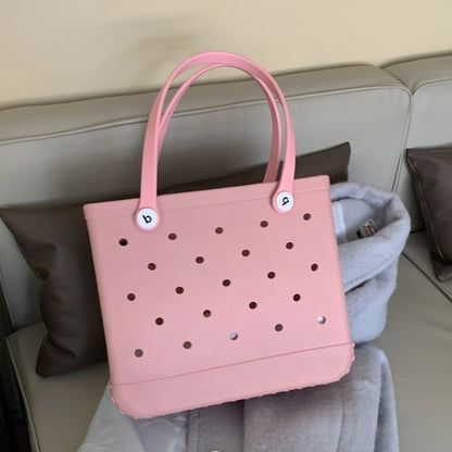 Raspberry Eurybia EVA rubber waterproof tote bag for beach, featuring a stylish design and durable material for beach outings.