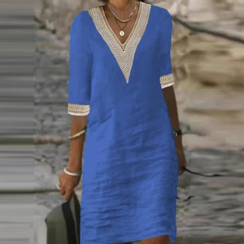 Yellow Eleusis elegant cotton linen dress with stylish bag, featuring natural fabric textures and sophisticated design details.