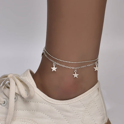 Silver plated Butterfly Bohemia ankle bracelet with chain design from Red Iphigenia, featuring delicate butterfly and bohemian style elements.