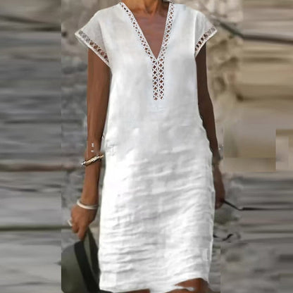Elegant cotton linen dress by Yellow Eleusis, displayed with a focus on the fabric texture and stylish design.