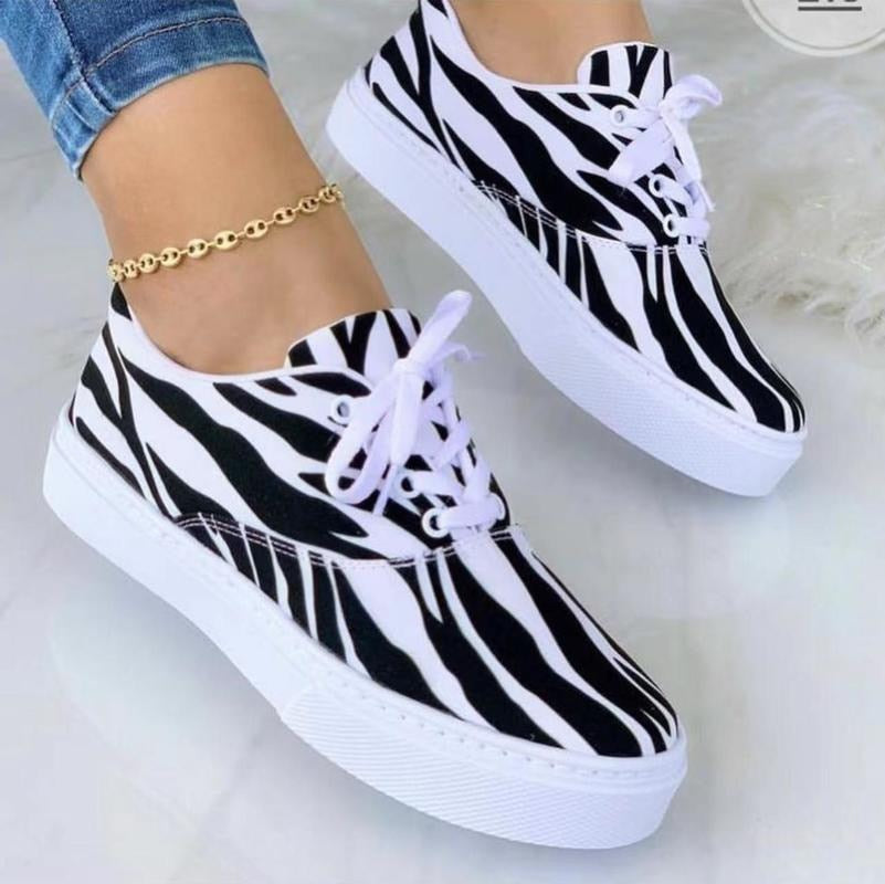Fashion graffiti women sneakers by Coffee Jasper featuring colorful artistic design on stylish footwear.